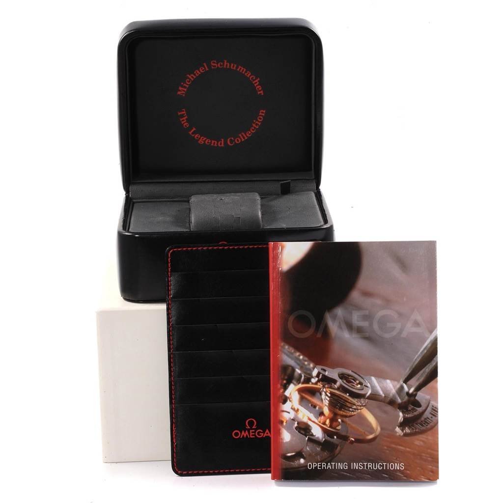 The image shows an Omega Speedmaster 3507.51.00 Men's Stainless Steel Black Dial 3507.51.00 Men's Stainless Steel Black Dial watch box, instruction booklet, and cardholder from a front angle.