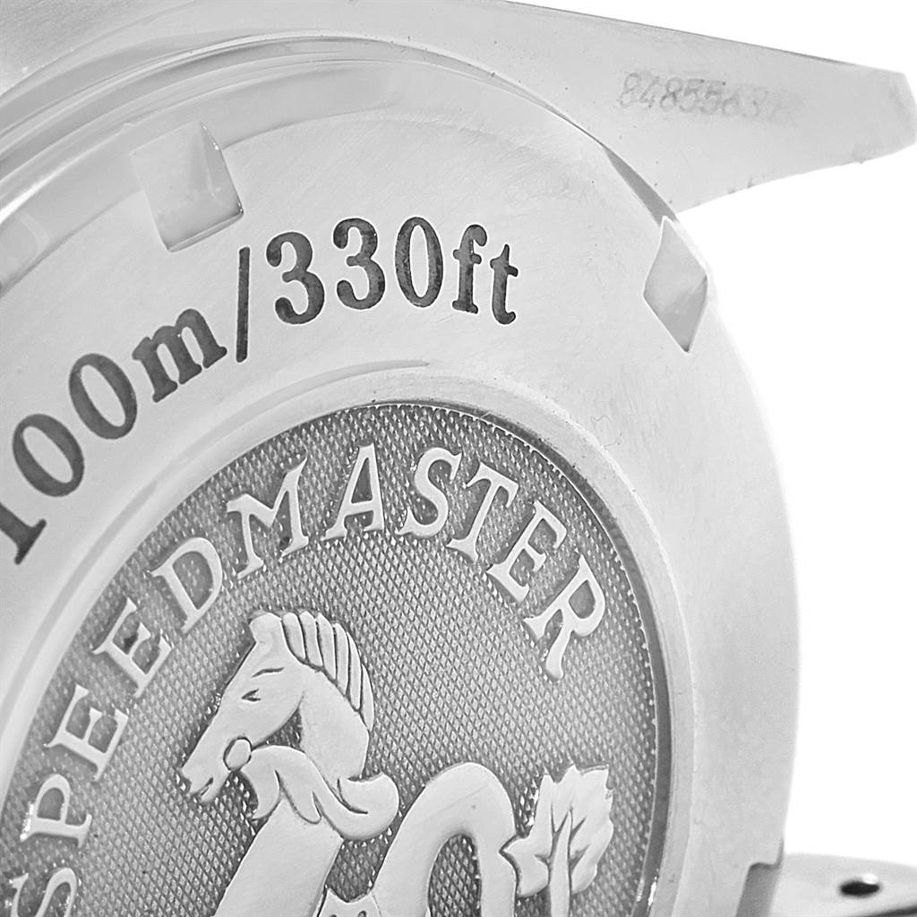 The image shows a close-up of the case back of an Omega Speedmaster 323.30.40.40.04.001 Men
s Stainless Steel White Dial 323.30.40.40.04.001 Men
s Stainless Steel White Dial, highlighting the "100m/330ft" water resistance engraving.