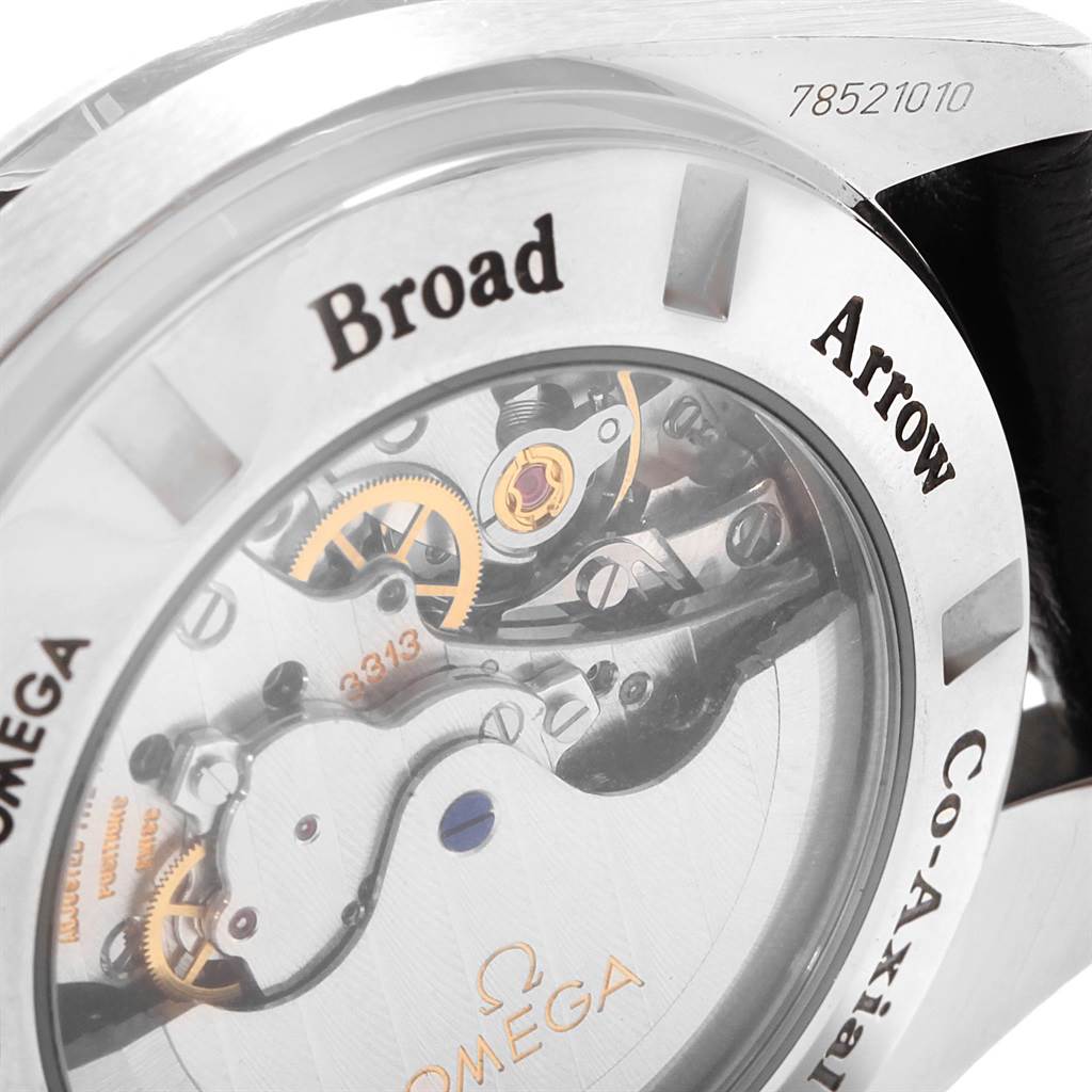 The image shows the backside of an Omega Speedmaster 321.13.44.50.02.001 Men
s Stainless Steel Silver Dial 321.13.44.50.02.001 Men
s Stainless Steel Silver Dial, highlighting its interior mechanics and branding on the case back.