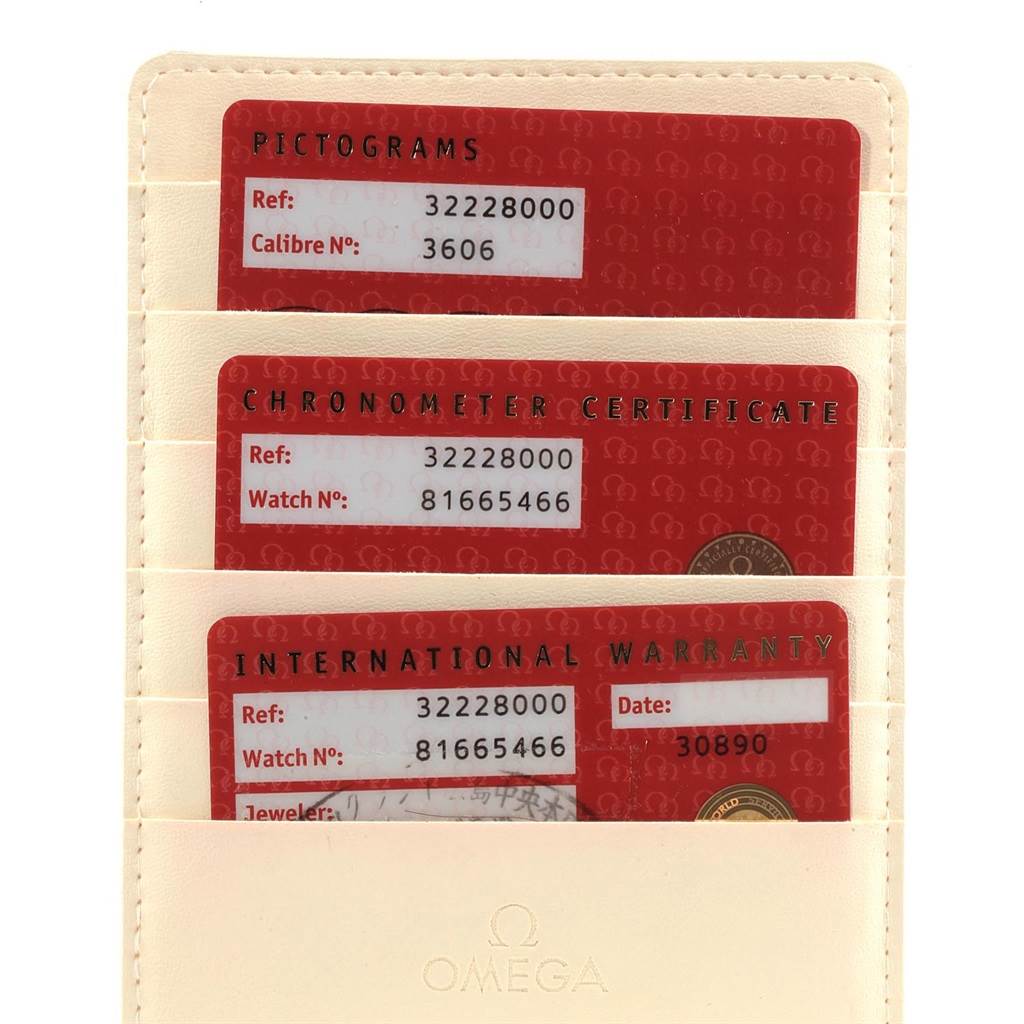 The image shows the pictograms, chronometer certificate, and international warranty cards for the Omega Speedmaster 3222.80.00 Men
s Stainless Steel Blue Dial 3222.80.00 Men
s Stainless Steel Blue Dial model.