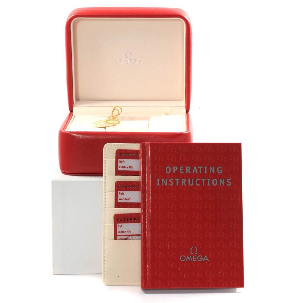 The image shows an Omega Speedmaster 3222.80.00 Men
s Stainless Steel Blue Dial 3222.80.00 Men
s Stainless Steel Blue Dial watch box, alongside the operating instructions and cards.