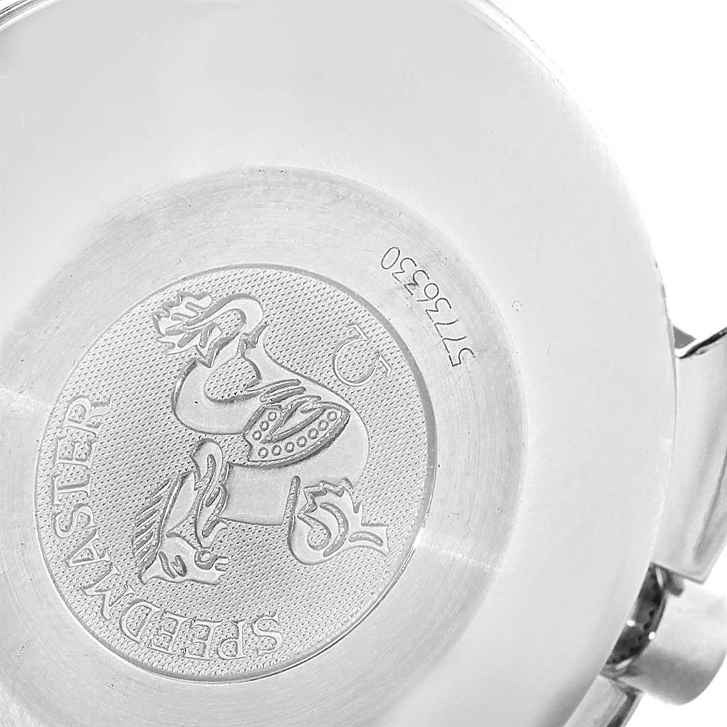 The image shows the engraved case back of an Omega Speedmaster 3513.30.00 Men
s Stainless Steel Silver Dial 3513.30.00 Men
s Stainless Steel Silver Dial watch at a close-up angle.