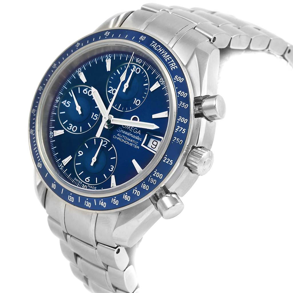 The Omega Speedmaster 3212.80.00 Men
s Stainless Steel Blue Dial 3212.80.00 Men
s Stainless Steel Blue Dial model watch is shown at a front-side angle, displaying its blue dial, chronograph subdials, and metal bracelet.