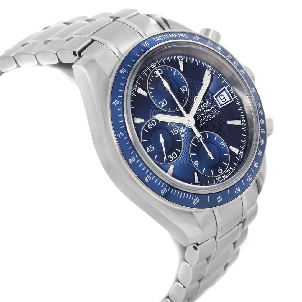 The image shows an angled view of the Omega Speedmaster 3212.80.00 Men
s Stainless Steel Blue Dial 3212.80.00 Men
s Stainless Steel Blue Dial watch, highlighting the dial, tachymeter bezel, and bracelet.