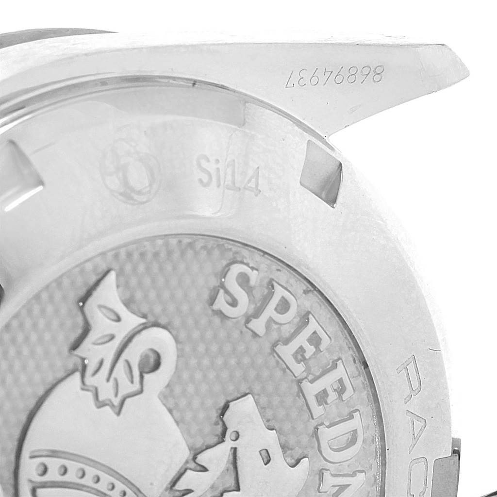 The image shows a close-up of the back case of an Omega Speedmaster 326.30.40.50.01.001 Men
s Stainless Steel Black Dial 326.30.40.50.01.001 Men
s Stainless Steel Black Dial watch, highlighting the engraved model name and logo.