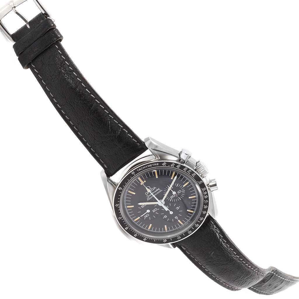 The image shows an Omega Speedmaster 145.022 Men
s Stainless Steel Black Dial 145.022 Men
s Stainless Steel Black Dial watch at a slight diagonal angle, featuring its face, bezel, and black leather strap.