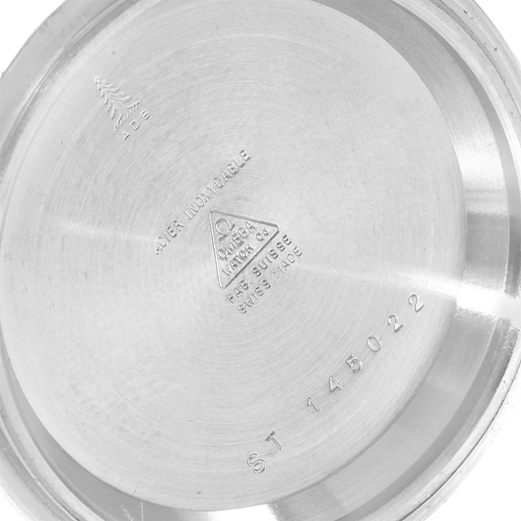 This image shows the inner case back of an Omega Speedmaster 145.022 Men
s Stainless Steel Black Dial 145.022 Men
s Stainless Steel Black Dial watch, featuring engravings and model information.