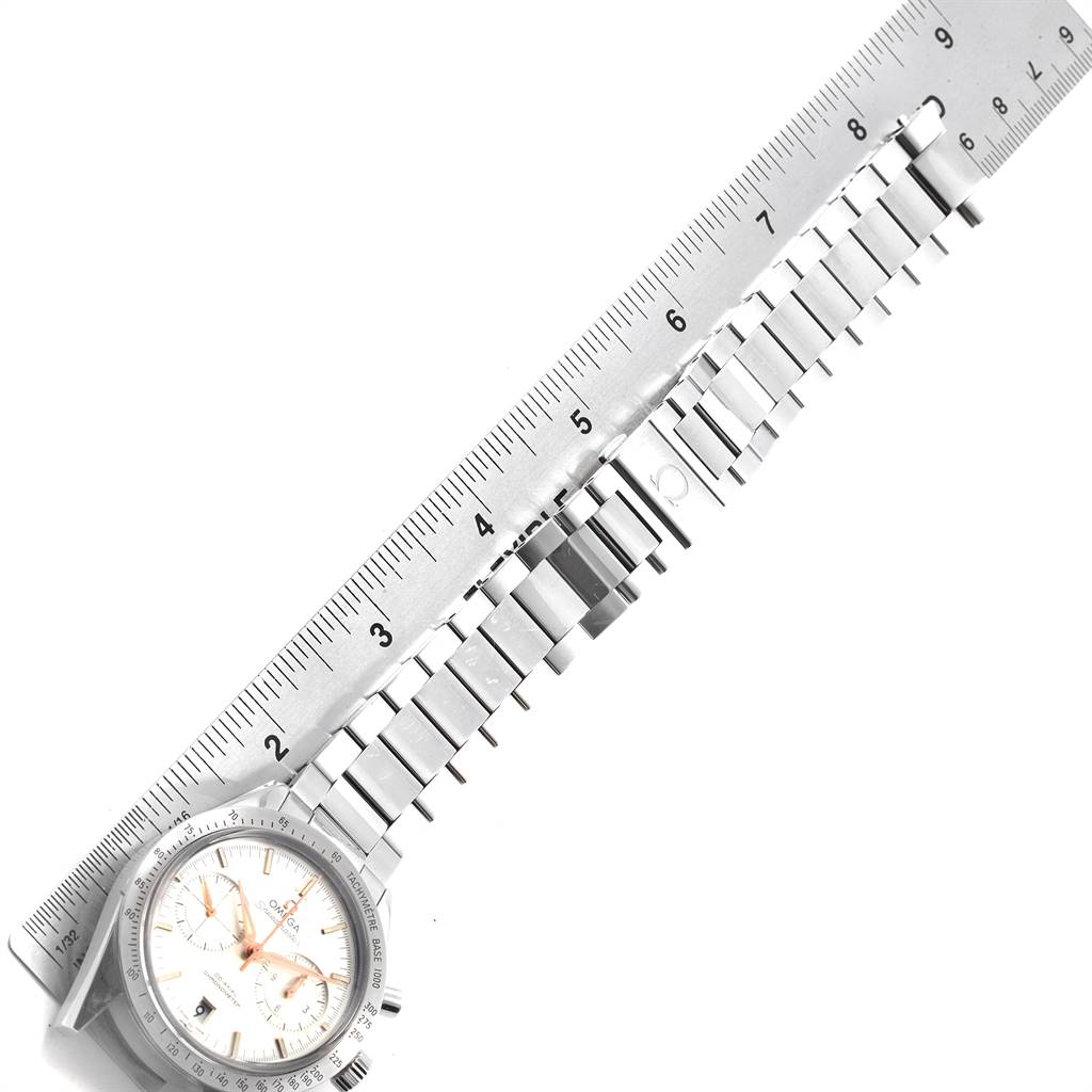 The image shows an Omega Speedmaster 331.10.42.51.02.002 Men
s Stainless Steel Silver Dial 331.10.42.51.02.002 Men
s Stainless Steel Silver Dial watch lying flat with its bracelet aligned alongside a ruler.