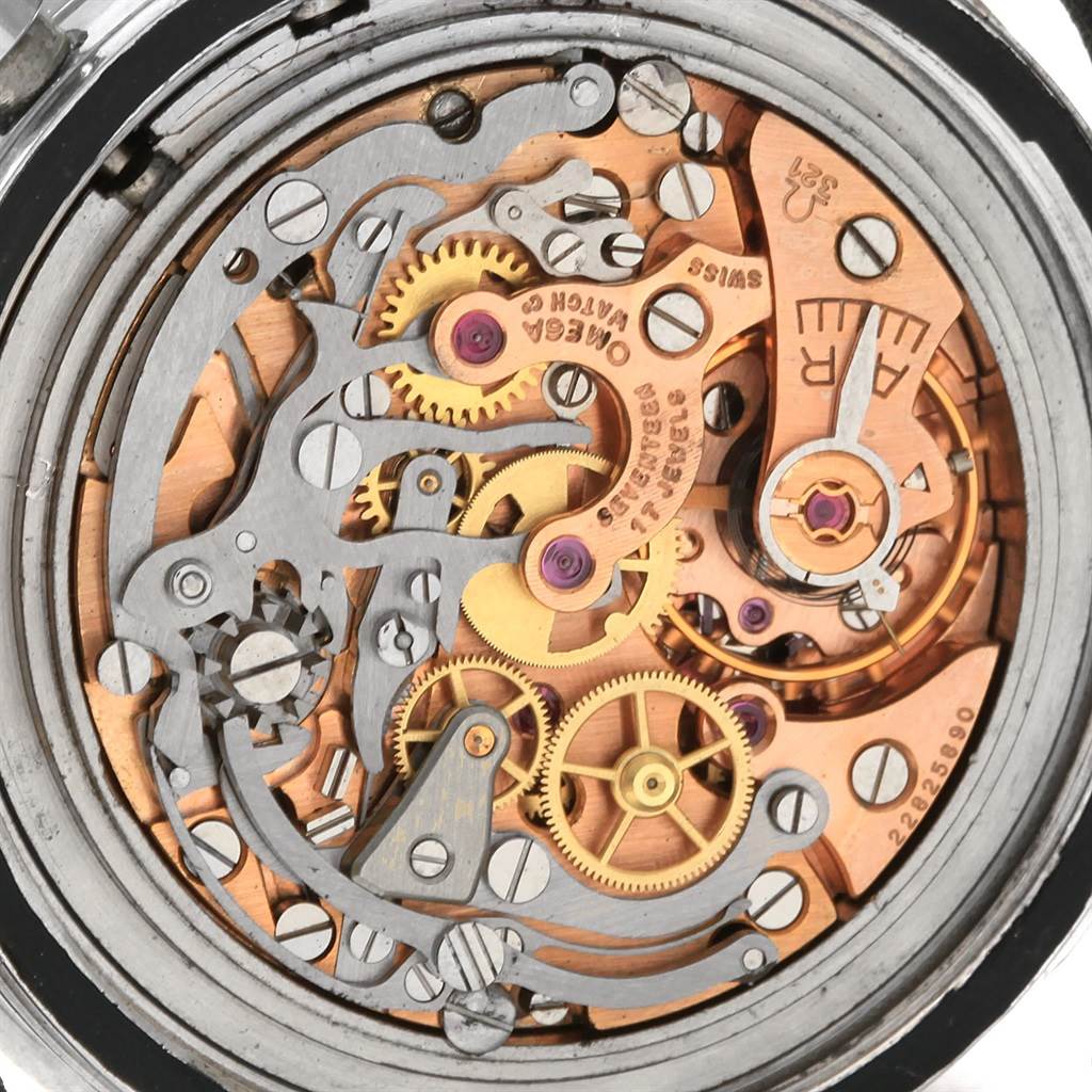 This is a close-up view of the Omega Speedmaster 105.003-65 Men's Stainless Steel Black Dial 105.003-65 Men's Stainless Steel Black Dial's movement, showcasing gears and mechanisms within the watch.