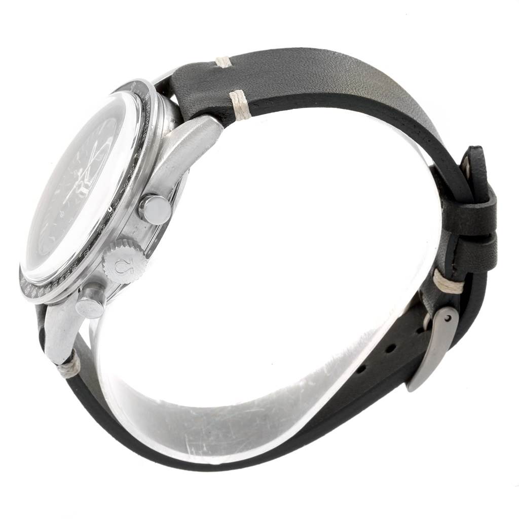 The Omega Speedmaster 105.003-65 Men's Stainless Steel Black Dial 105.003-65 Men's Stainless Steel Black Dial watch is shown from a side angle highlighting the crown, pushers, case, and leather strap.