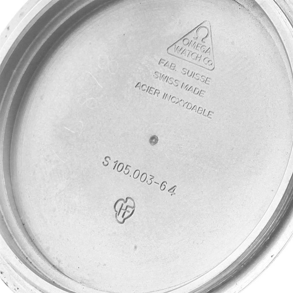 The image shows the inside case back of an Omega Speedmaster 105.003-64 Men
s Stainless Steel Black Dial 105.003-64 Men
s Stainless Steel Black Dial watch with model number S 105.003-64.