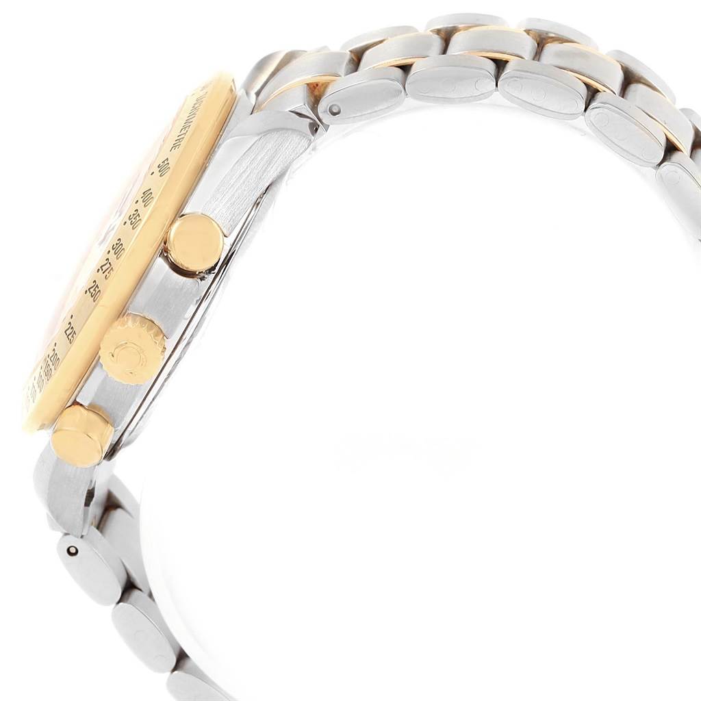 This image shows a side view of an Omega Speedmaster 3313.33.00 Men's Steel and Gold (two tone) White Dial 3313.33.00 Men's Steel and Gold (two tone) White Dial watch with focus on the crown, pushers, and stainless steel bracelet.