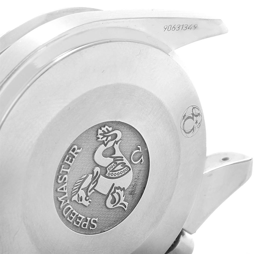 The image shows the back case of an Omega Speedmaster 3539.50.00 Men
s Stainless Steel Black Dial 3539.50.00 Men
s Stainless Steel Black Dial watch, with an engraved emblem and serial number.