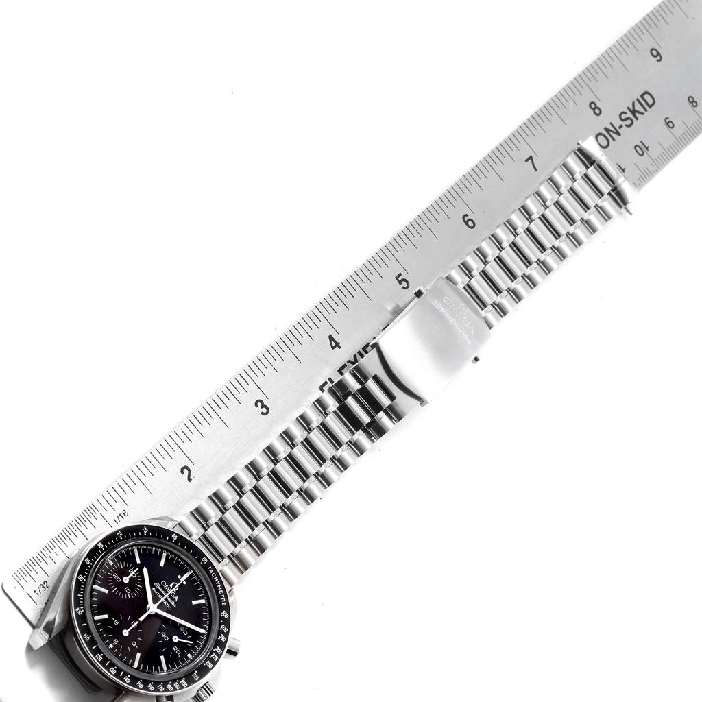The image shows the Omega Speedmaster 3539.50.00 Men
s Stainless Steel Black Dial 3539.50.00 Men
s Stainless Steel Black Dial watch and its stainless steel bracelet alongside a ruler for measurement.