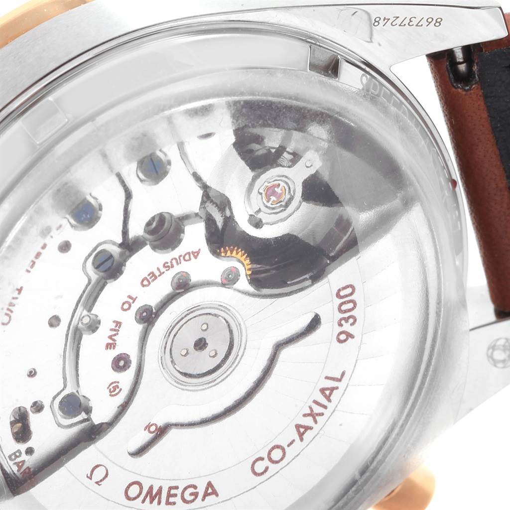 The image shows the case back of an Omega Speedmaster 331.22.42.51.01.001 Men's Steel and Gold (two tone) Black Dial 331.22.42.51.01.001 Men's Steel and Gold (two tone) Black Dial watch, highlighting the Co-Axial 9300 movement.