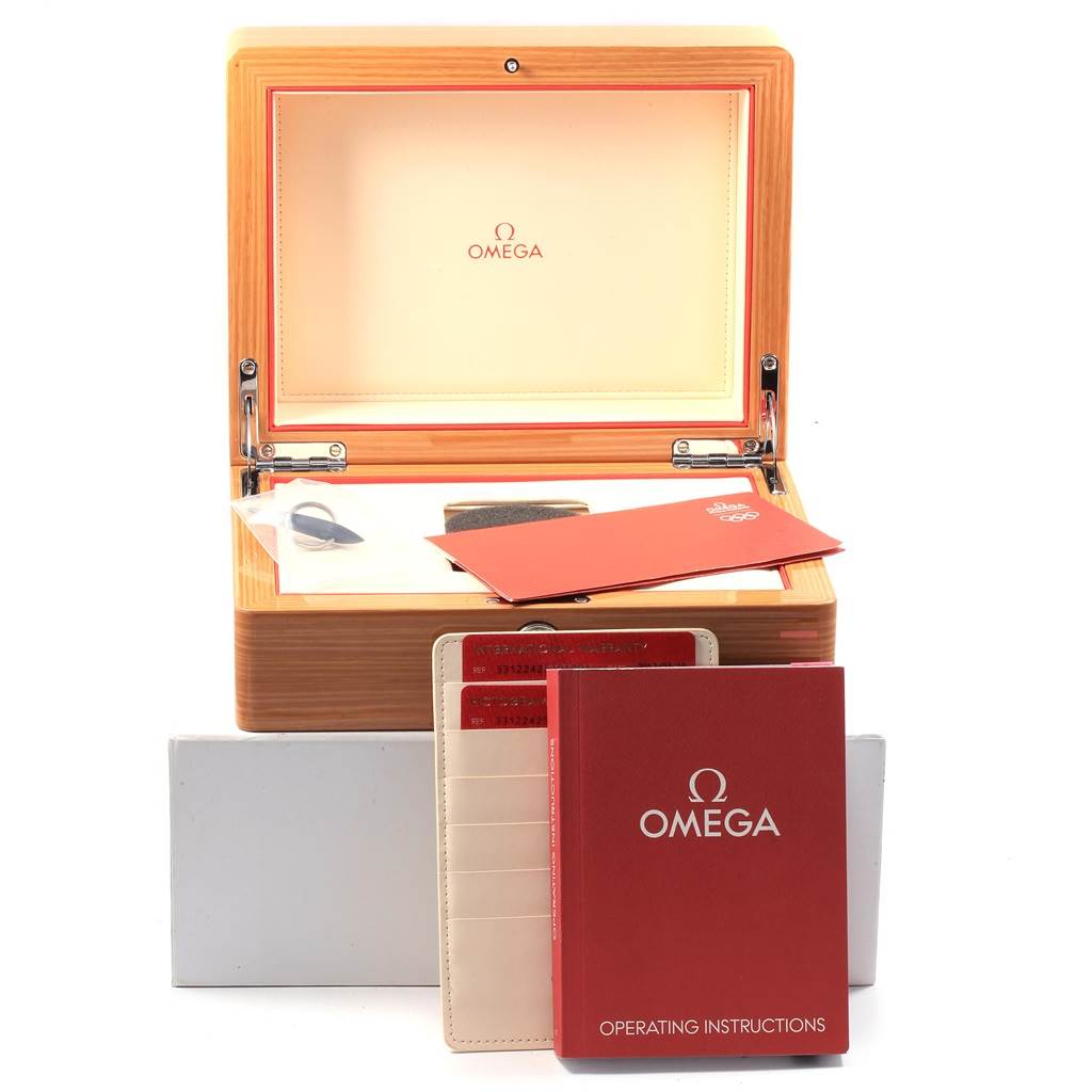 The image shows the Omega Speedmaster 331.22.42.51.01.001 Men's Steel and Gold (two tone) Black Dial 331.22.42.51.01.001 Men's Steel and Gold (two tone) Black Dial watch box, operating instructions, cards, and cardholder, viewed from the front.