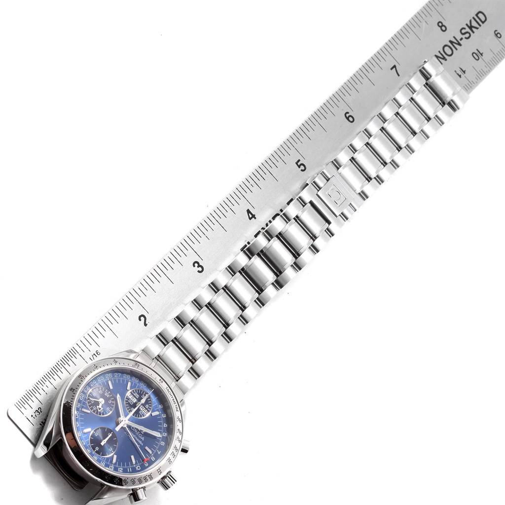 This image shows an Omega Speedmaster 3523.80.00 Men
s Stainless Steel Blue Dial 3523.80.00 Men
s Stainless Steel Blue Dial watch and part of its metal bracelet, measured with a ruler.