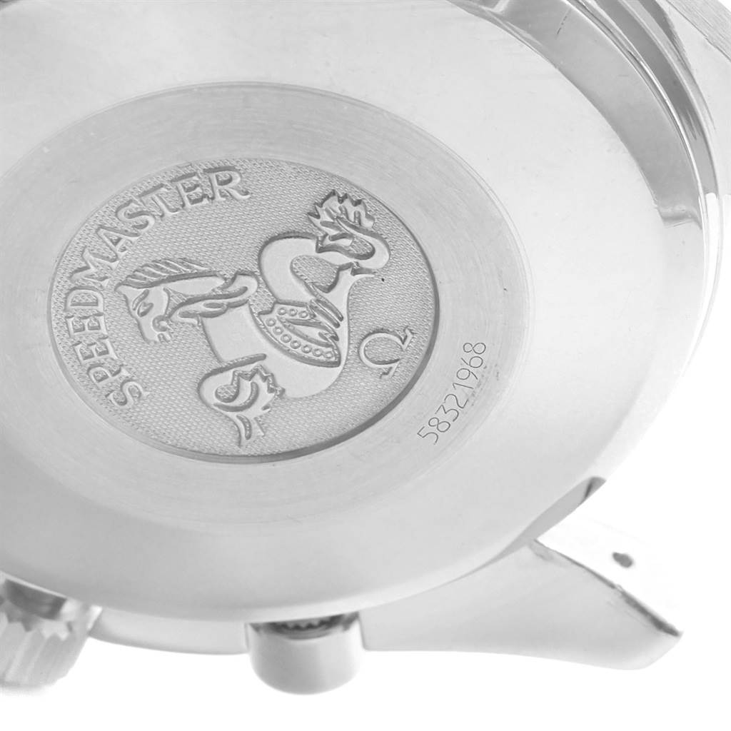 The image shows the case back of an Omega Speedmaster 3523.80.00 Men
s Stainless Steel Blue Dial 3523.80.00 Men
s Stainless Steel Blue Dial watch, featuring an engraved emblem and serial number.