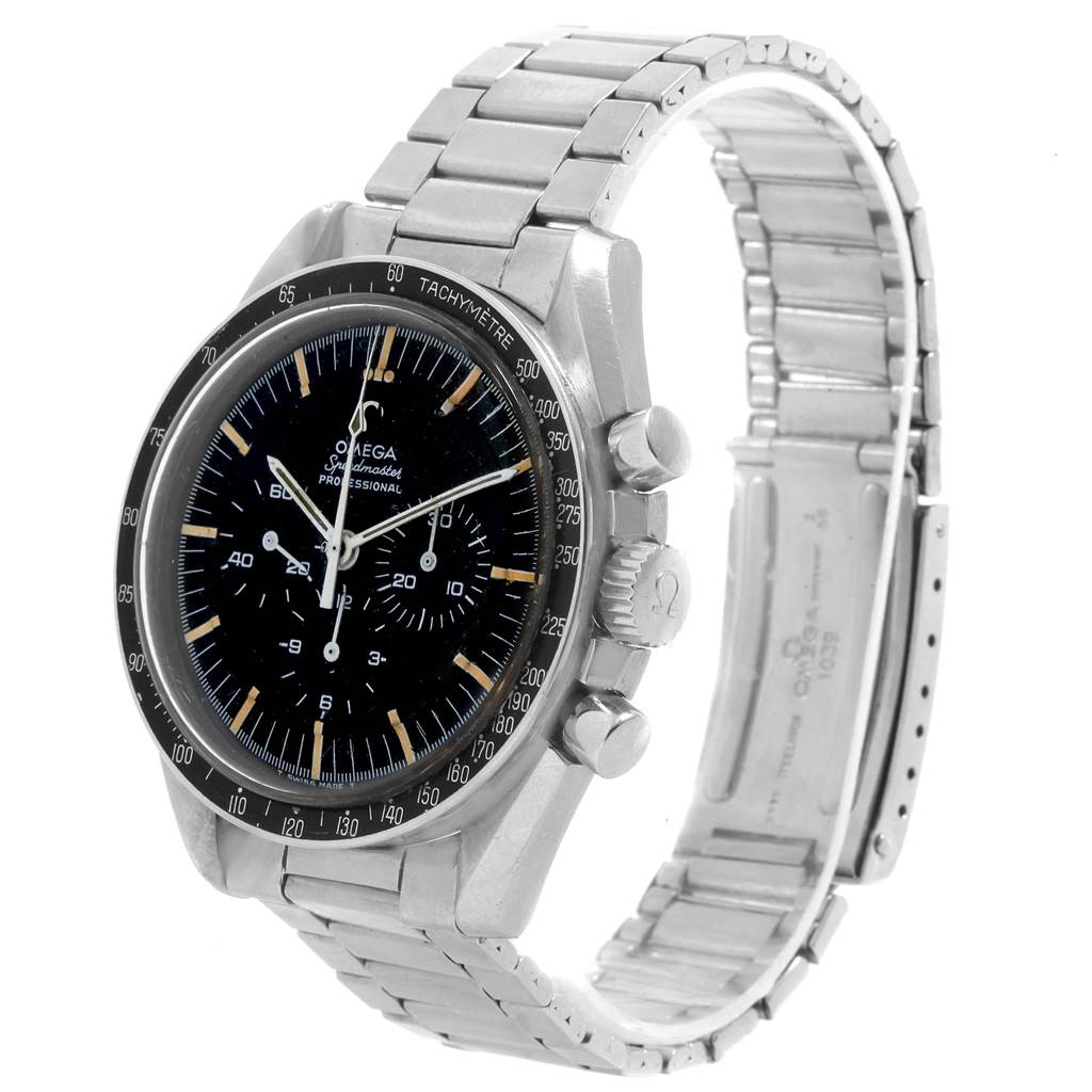 The Omega Speedmaster 145.012 Men
s Stainless Steel Black Dial 145.012 Men
s Stainless Steel Black Dial watch is shown at an angle displaying its face, tachymeter bezel, three subdials, and stainless steel bracelet.
