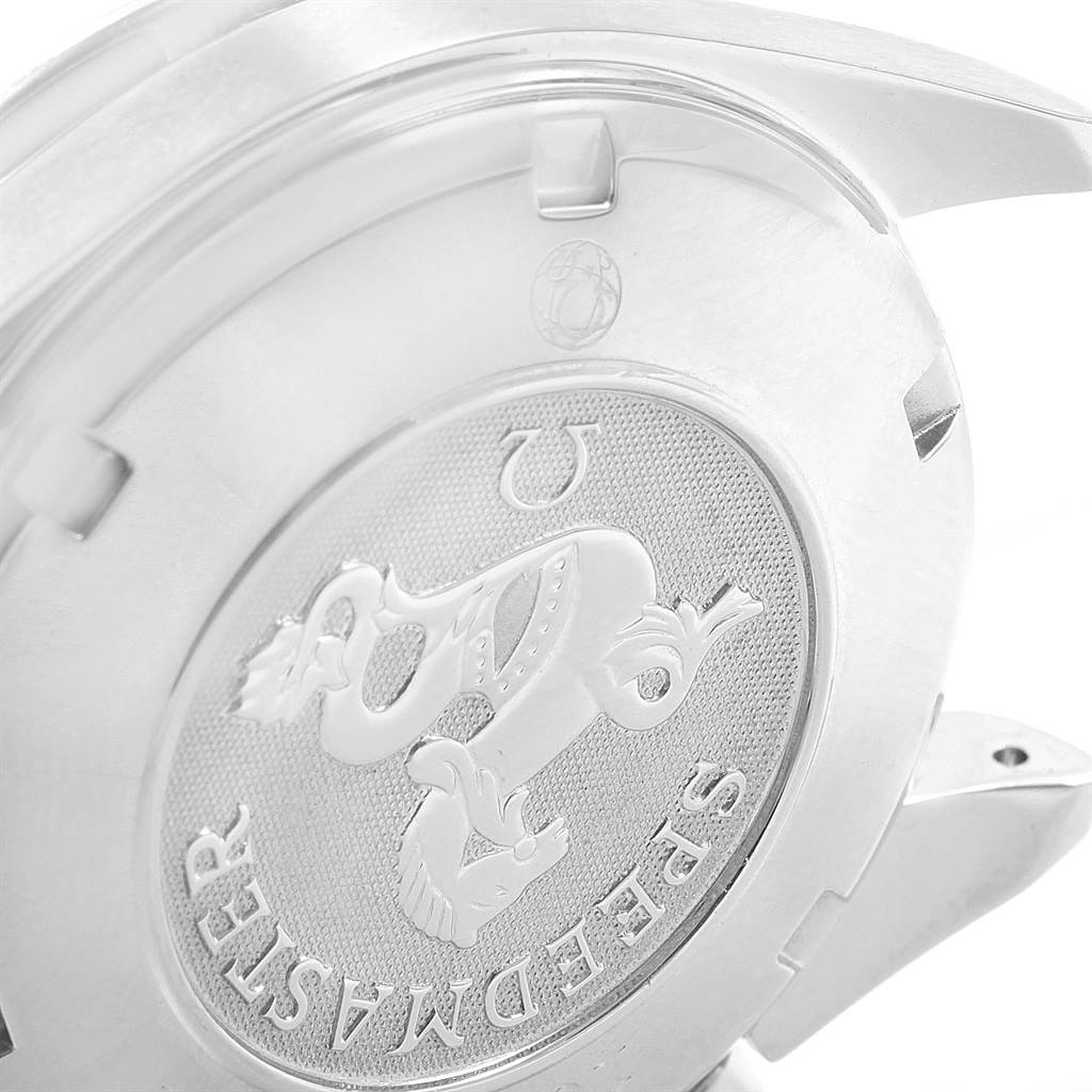 The image shows the engraved case back of an Omega Speedmaster 3212.80.00 Men
s Stainless Steel Blue Dial 3212.80.00 Men
s Stainless Steel Blue Dial watch, viewed from an angled close-up.