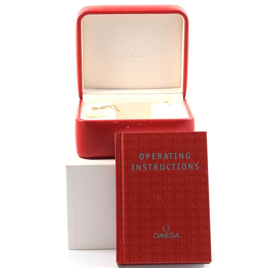 The image shows an Omega Speedmaster 3212.80.00 Men
s Stainless Steel Blue Dial 3212.80.00 Men
s Stainless Steel Blue Dial watch box and its operating instructions, photographed from the front.