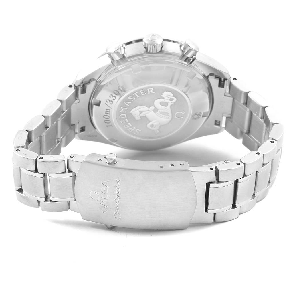 The image shows the back case and bracelet of an Omega Speedmaster 3210.52.00 Men
s Stainless Steel Black Dial 3210.52.00 Men
s Stainless Steel Black Dial watch, focusing on the clasp and engraved case back.