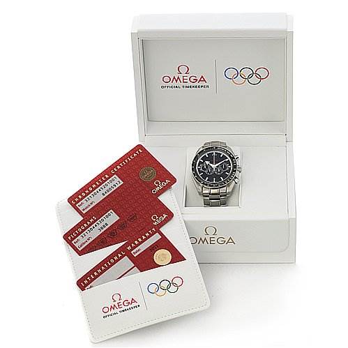 The image shows an Omega Speedmaster 321.30.44.52.01.001 Men
s Stainless Steel Black Dial 321.30.44.52.01.001 Men
s Stainless Steel Black Dial watch in its box, along with warranty and certificate cards.