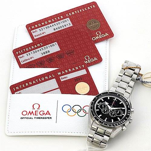 The image shows an Omega Speedmaster 321.30.44.52.01.001 Men
s Stainless Steel Black Dial 321.30.44.52.01.001 Men
s Stainless Steel Black Dial watch along with its chronometer certificate, pictograms card, and international warranty card.