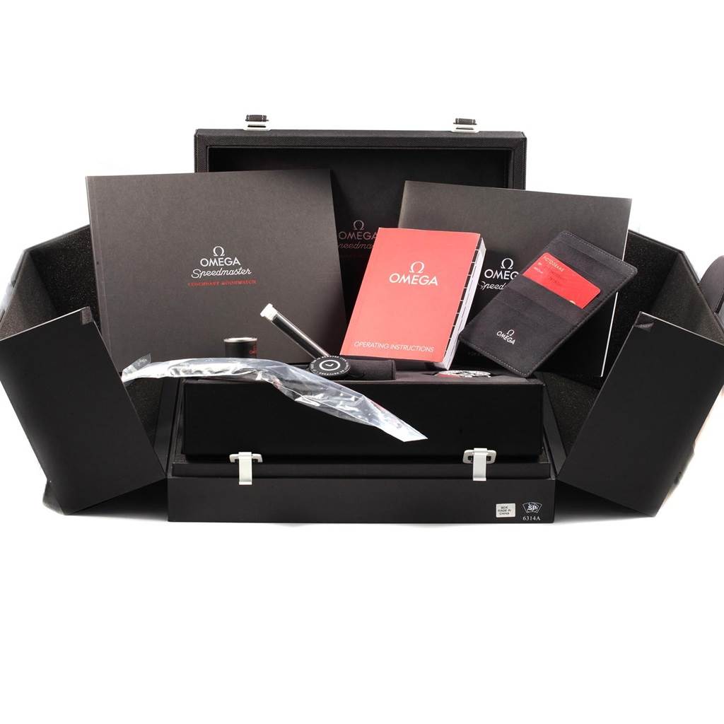 The image shows the Omega Speedmaster 311.33.42.30.01.001 Men
s Stainless Steel Black Dial 311.33.42.30.01.001 Men
s Stainless Steel Black Dial watch set, including manuals, a cardholder, and packaging from a frontal angle.