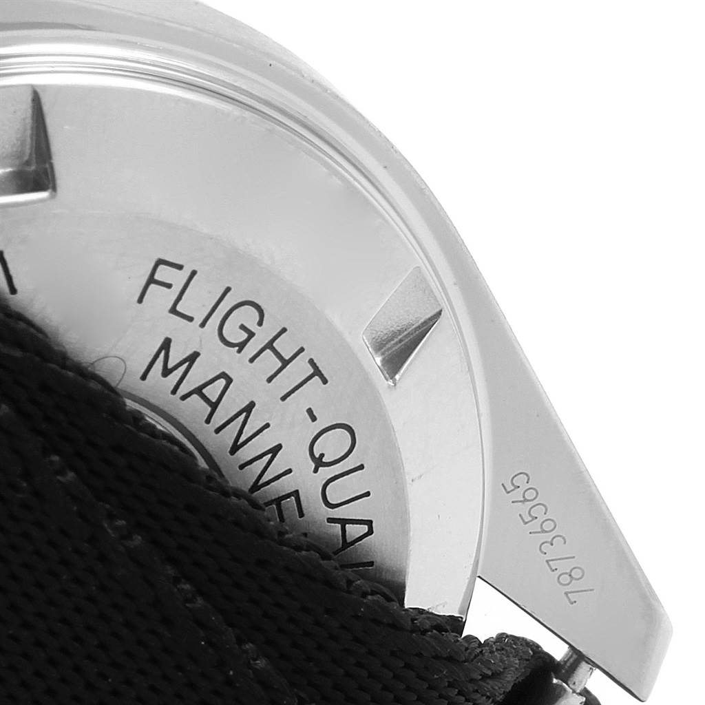 The image shows a close-up of the case back and strap of an Omega Speedmaster 311.33.42.30.01.001 Men
s Stainless Steel Black Dial 311.33.42.30.01.001 Men
s Stainless Steel Black Dial watch, featuring engraved text.