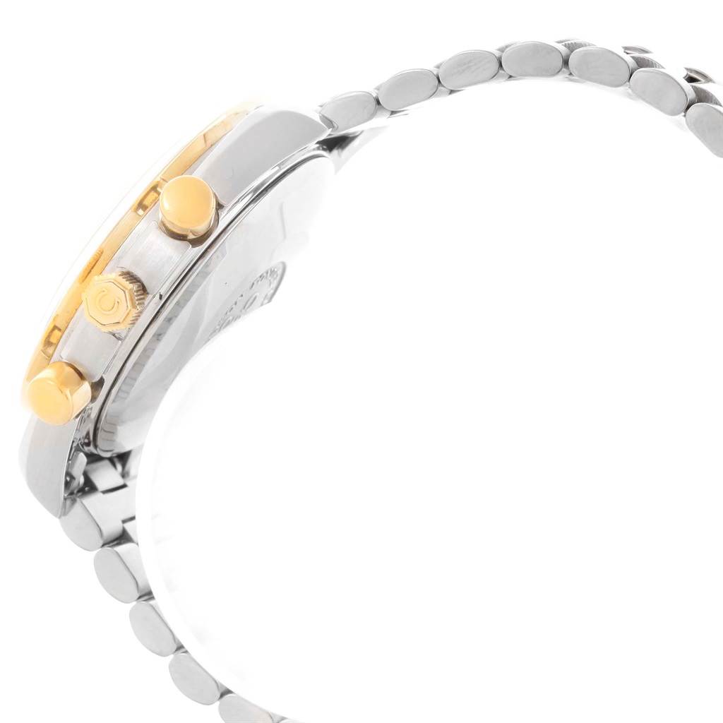 The image shows a side view of an Omega Speedmaster 3330.20.00 Men
s Stainless Steel White Dial 3330.20.00 Men
s Stainless Steel White Dial watch detailing its pushers, crown, and metal bracelet.