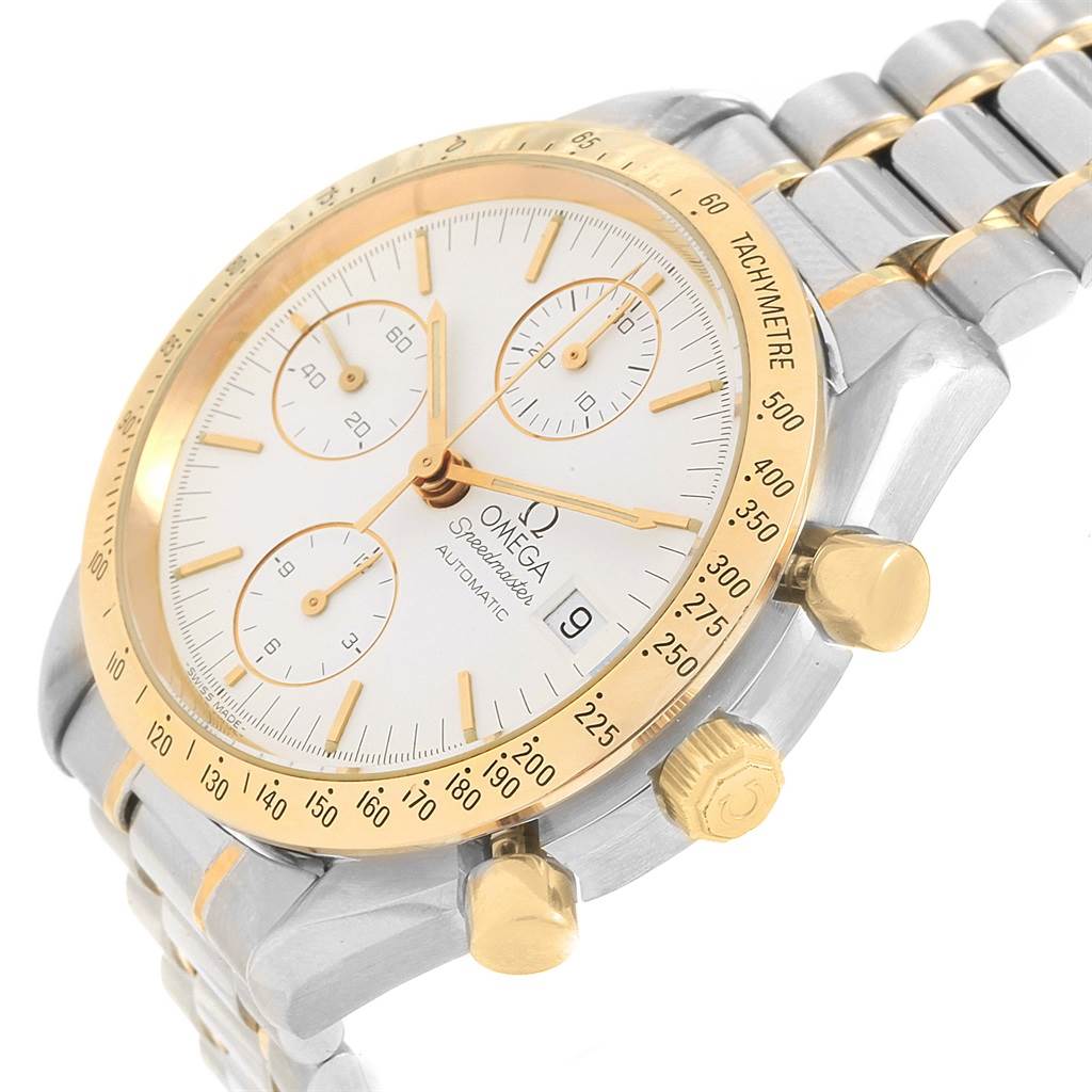 The image shows an Omega Speedmaster 3311.20.00 Men's Steel and Gold (two tone) White Dial 3311.20.00 Men's Steel and Gold (two tone) White Dial watch from a front angle, highlighting its gold bezel, sub-dials, and metal band.