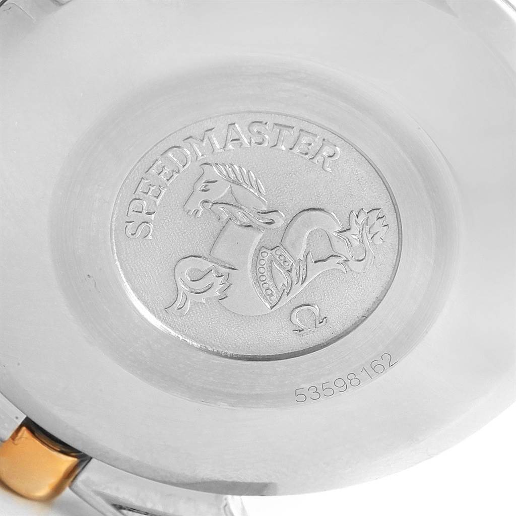 The image shows the case back of an Omega Speedmaster 3311.20.00 Men's Steel and Gold (two tone) White Dial 3311.20.00 Men's Steel and Gold (two tone) White Dial watch, featuring the engraved logo and serial number.