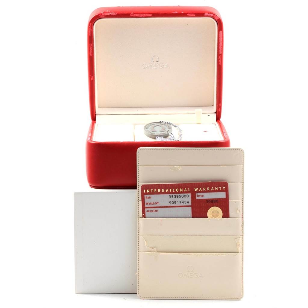 The image shows an Omega Speedmaster 3539.50.00 Men
s Stainless Steel Black Dial 3539.50.00 Men
s Stainless Steel Black Dial in its box, along with an international warranty card and cardholder in front.