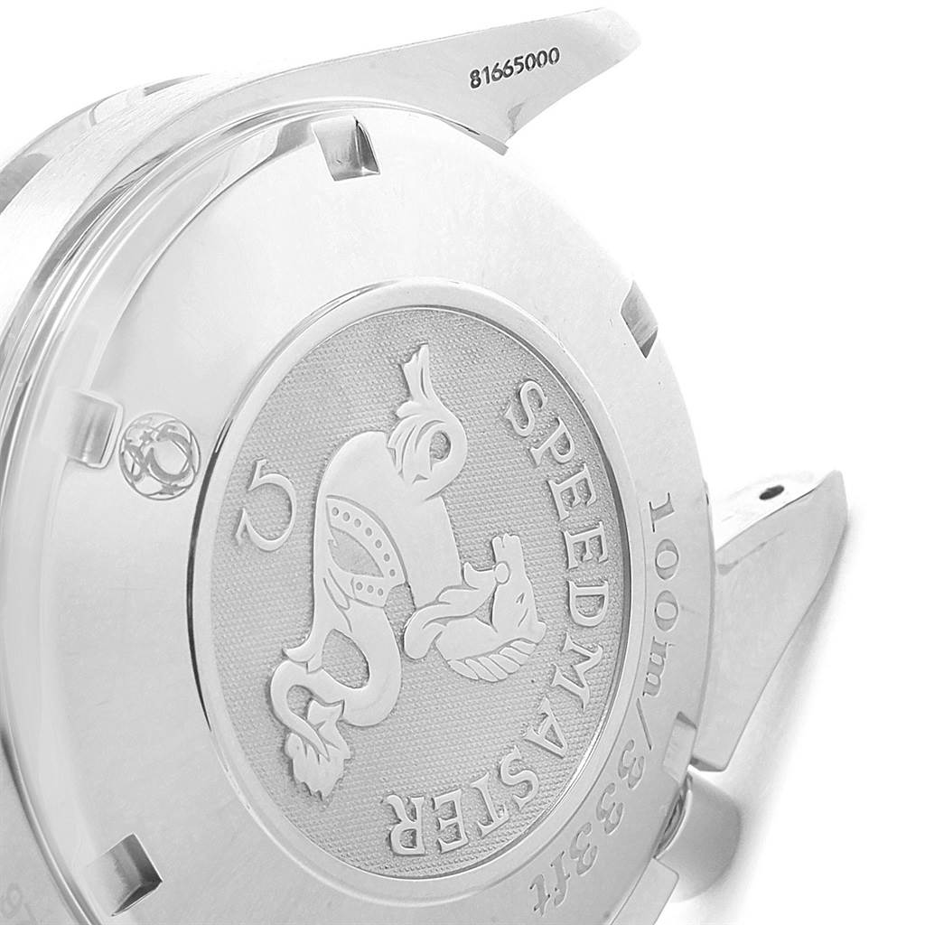 The image shows the case back of an Omega Speedmaster 3221.30.00 Men's Stainless Steel Silver Dial 3221.30.00 Men's Stainless Steel Silver Dial watch, highlighting the Speedmaster engraving and emblem.