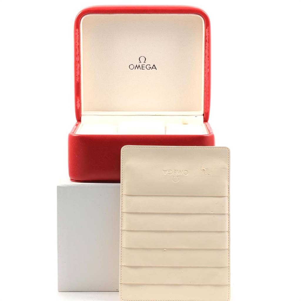 The image shows a red Omega Speedmaster 326.30.40.50.06.001 Men
s Stainless Steel Grey Dial 326.30.40.50.06.001 Men
s Stainless Steel Grey Dial watch box and a beige Omega accessory case, both photographed from the front.