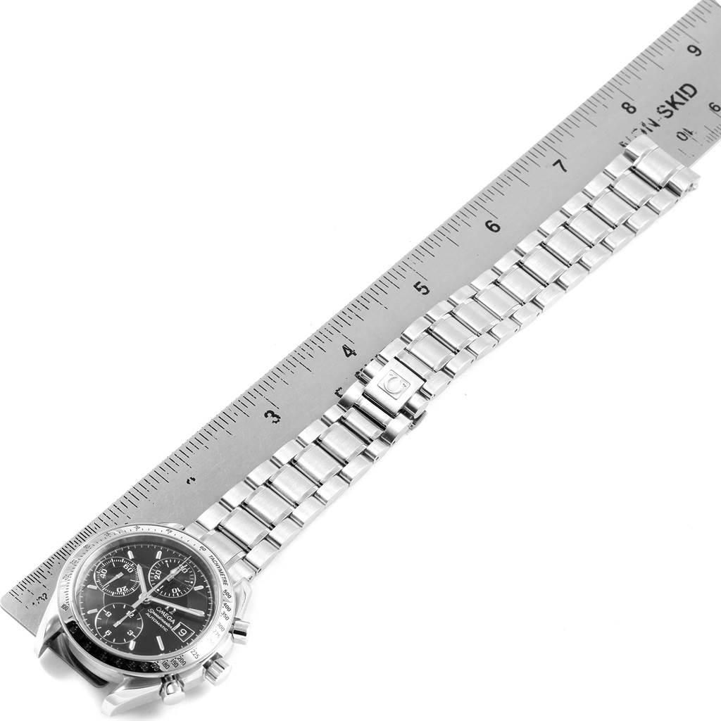 The image shows an Omega Speedmaster 3513.50.00 Men
s Stainless Steel Black Dial 3513.50.00 Men
s Stainless Steel Black Dial watch laid flat with a ruler, displaying the face, bracelet, and clasp.