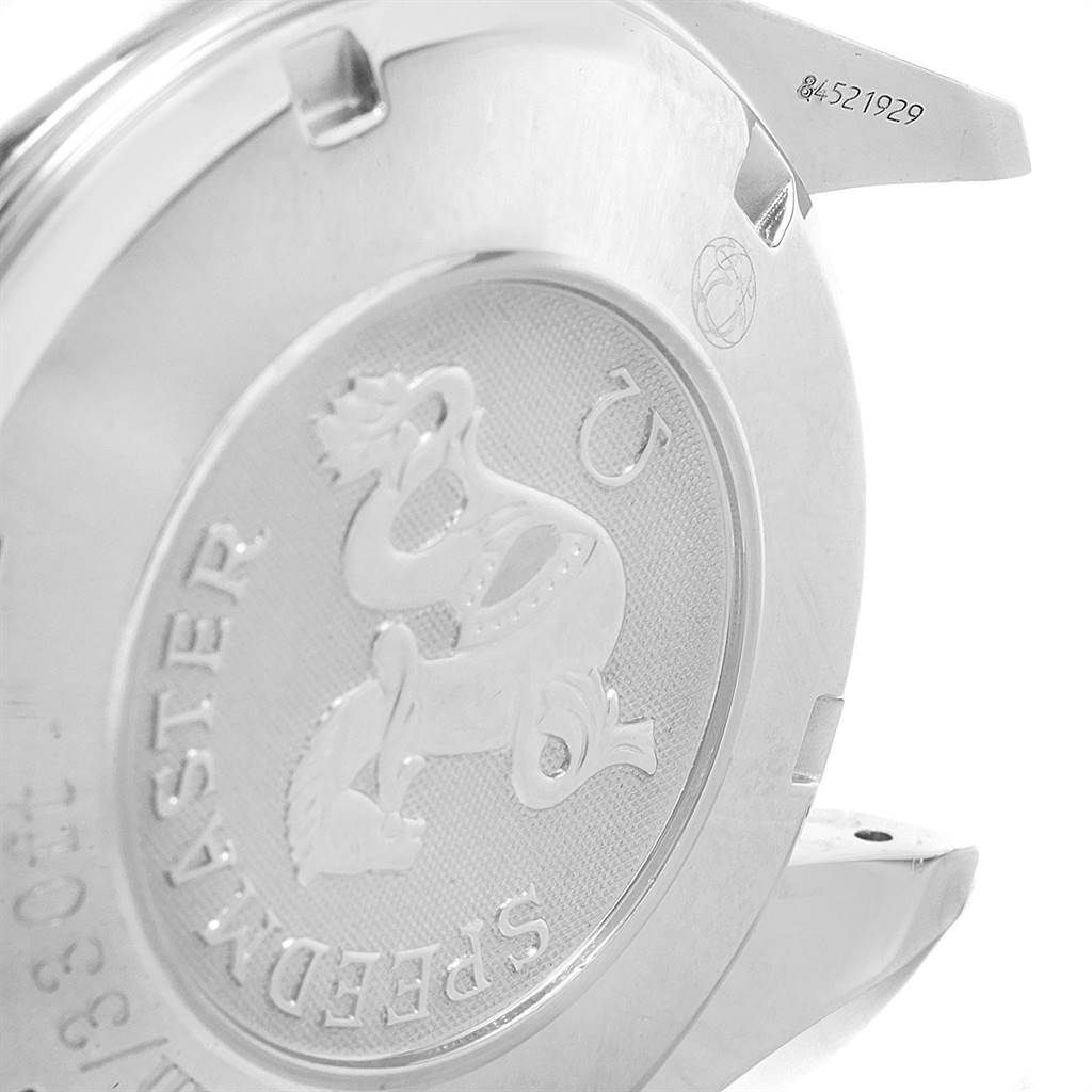 The image shows the back case of an Omega Speedmaster 3210.51.00 Men's Stainless Steel Black Dial 3210.51.00 Men's Stainless Steel Black Dial watch with an engraved logo and serial number.