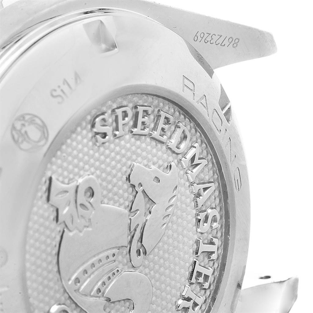 This close-up image shows the back case of an Omega Speedmaster 326.30.40.50.01.001 Men
s Stainless Steel Black Dial 326.30.40.50.01.001 Men
s Stainless Steel Black Dial watch, highlighting its engraved logo and text.