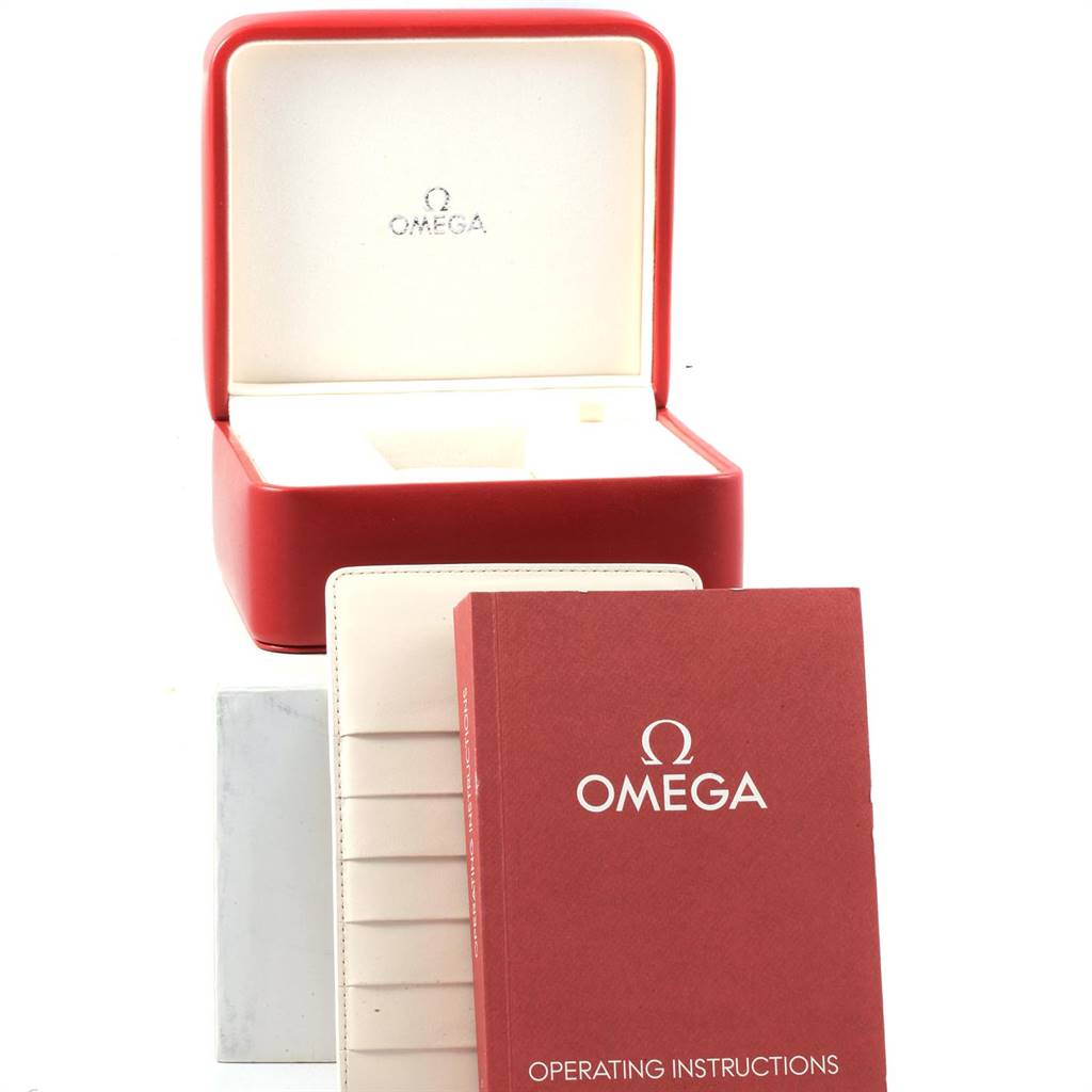 The image shows the packaging box, operating instructions, and documentation for the Omega Speedmaster 327.10.43.50.06.001 Men
s Stainless Steel Grey Dial 327.10.43.50.06.001 Men
s Stainless Steel Grey Dial watch.