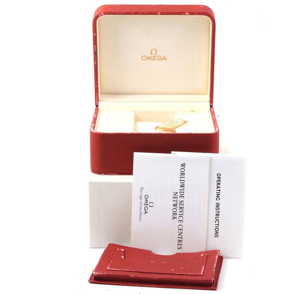 The image shows an Omega Speedmaster 3576.50.00 Men
s Stainless Steel Black Dial 3576.50.00 Men
s Stainless Steel Black Dial watch box and papers, including operating instructions and a service network booklet.