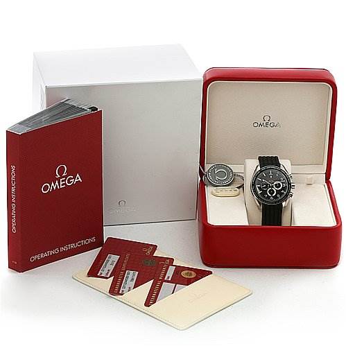 The Omega Speedmaster 321.32.44.50.01.001 Men
s Stainless Steel Black Dial 321.32.44.50.01.001 Men
s Stainless Steel Black Dial watch is displayed in a red case with its accessories, including an operation manual and certification cards.