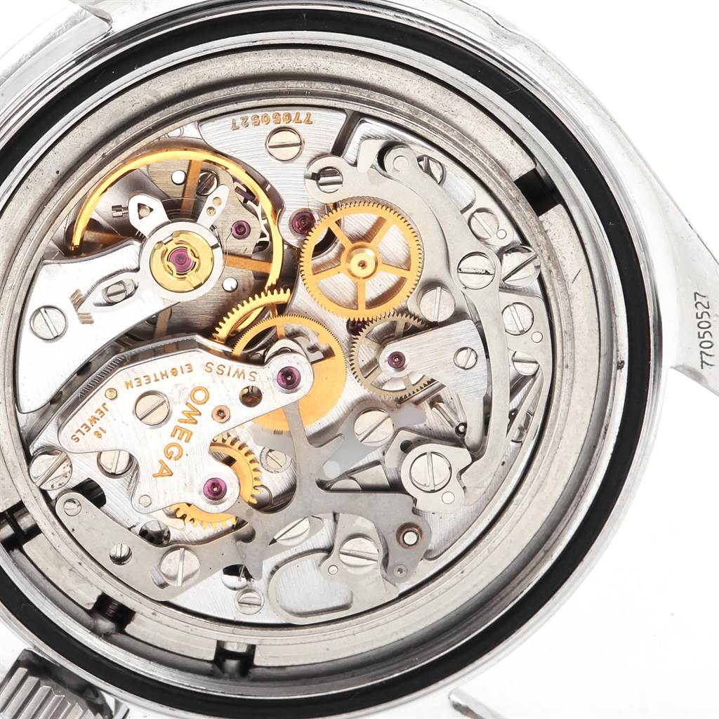 Close-up view of the movement mechanism inside the Omega Speedmaster 3594.50.00 Men
s Stainless Steel Black Dial 3594.50.00 Men
s Stainless Steel Black Dial watch, highlighting its intricate gears and components.