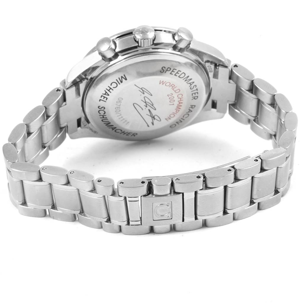 This image shows the back, the bracelet, and the clasp of an Omega Speedmaster 3519.50.00 Men
s Stainless Steel Black Dial 3519.50.00 Men
s Stainless Steel Black Dial watch, highlighting engravings on the back.