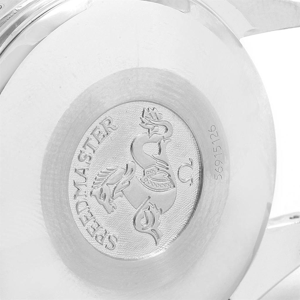 The image shows the back case of an Omega Speedmaster 3520.50.00 Men
s Stainless Steel Black Dial 3520.50.00 Men
s Stainless Steel Black Dial watch, highlighting its engraved logo and serial number.