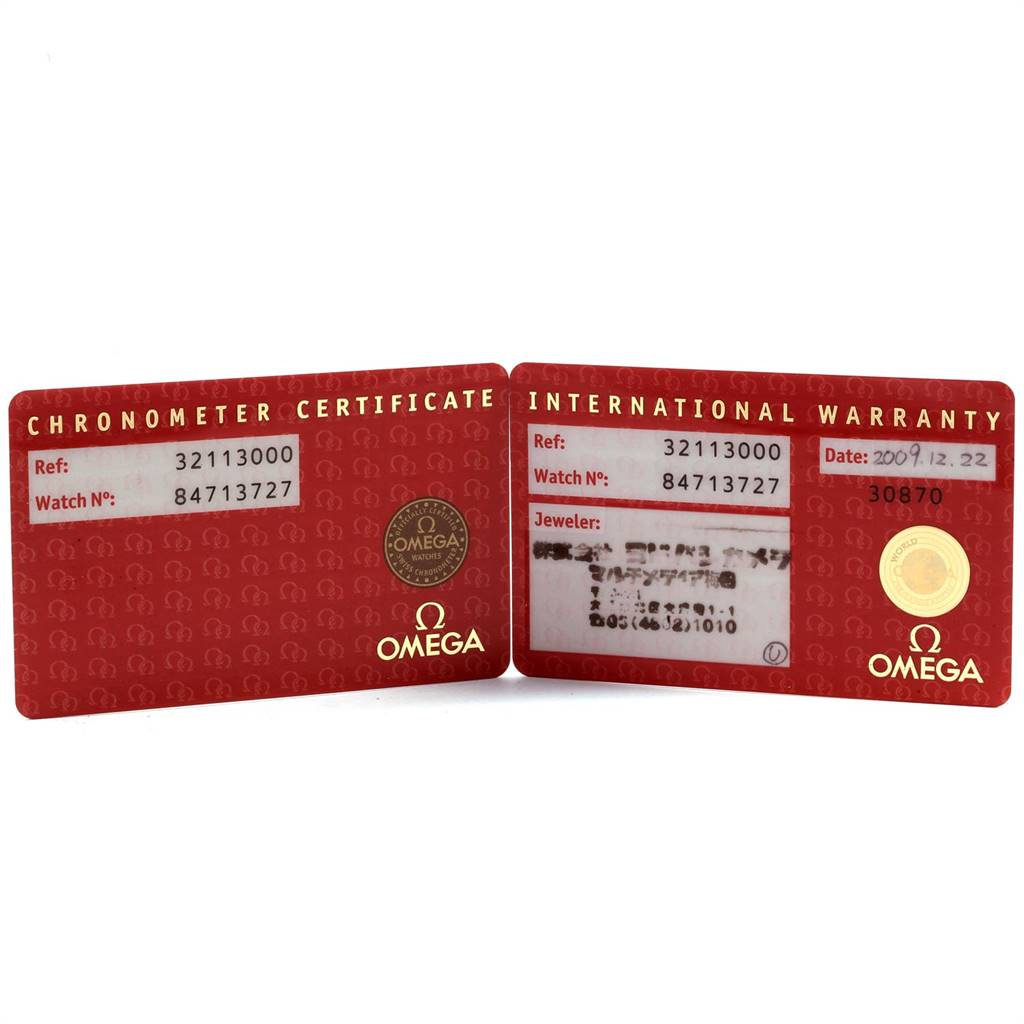 This image shows the Chronometer Certificate and International Warranty cards for the Omega Speedmaster 3211.30.00 Men
s Stainless Steel Silver Dial 3211.30.00 Men
s Stainless Steel Silver Dial model.