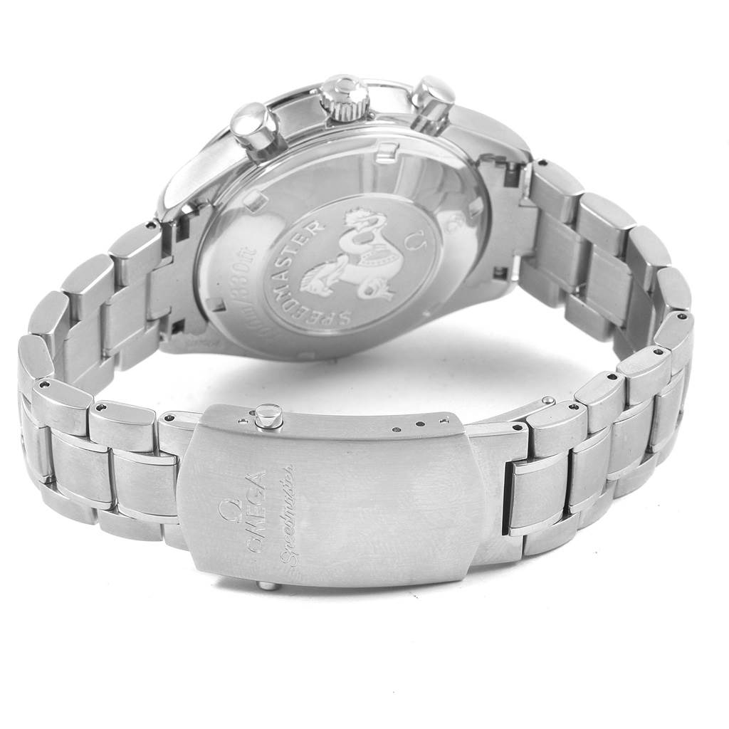 The image shows the back view of an Omega Speedmaster 3210.51.00 Men
s Stainless Steel Black Dial 3210.51.00 Men
s Stainless Steel Black Dial watch, highlighting its bracelet, clasp, and engraved case back.