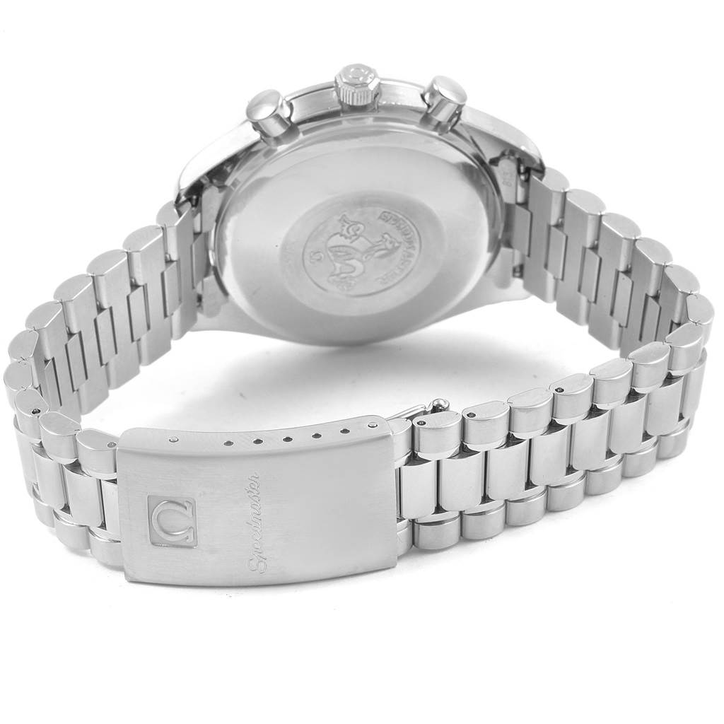 The image shows the backside of an Omega Speedmaster 3521.80.00 Men
s Stainless Steel Blue Dial 3521.80.00 Men
s Stainless Steel Blue Dial watch, highlighting its metal bracelet and clasp.