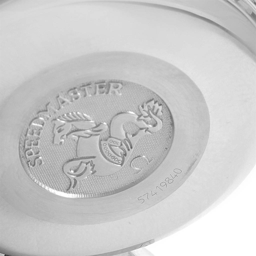 The image shows the case back of an Omega Speedmaster 3523.80.00 Men
s Stainless Steel Blue Dial 3523.80.00 Men
s Stainless Steel Blue Dial model, featuring an engraved design with the Speedmaster logo.