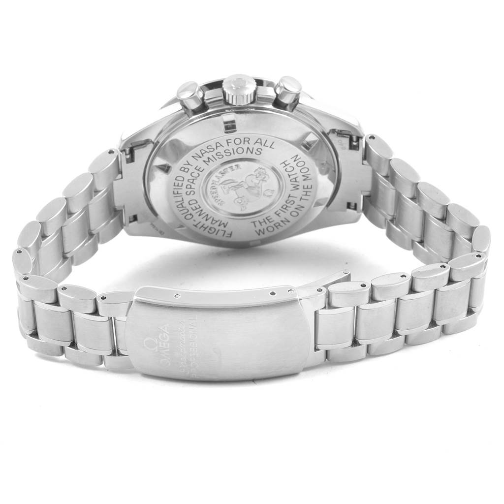 The image shows the back of an Omega Speedmaster 3570.50.00 Men
s Stainless Steel Black Dial 3570.50.00 Men
s Stainless Steel Black Dial watch, highlighting the case back and the stainless steel bracelet with the clasp open.